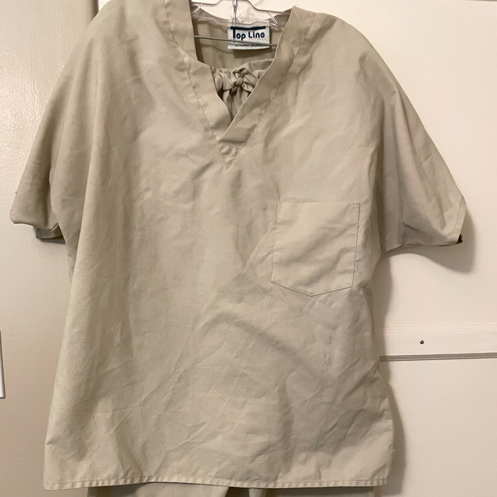Pair of matching scrubs. Unisex good for working in medical field or Halloween.
